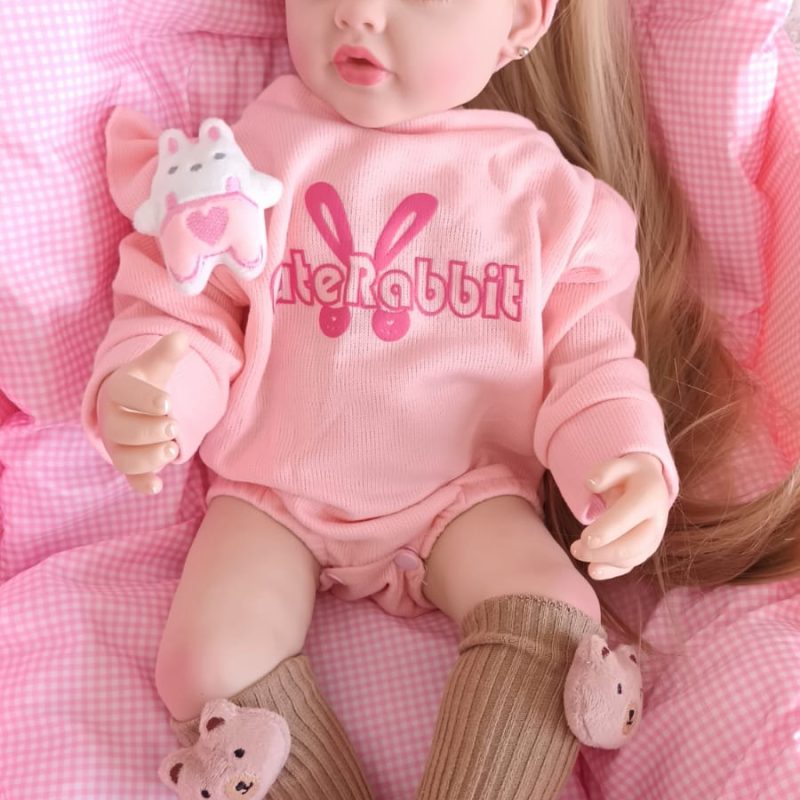 Muñeca pelo rubio vinilo completo